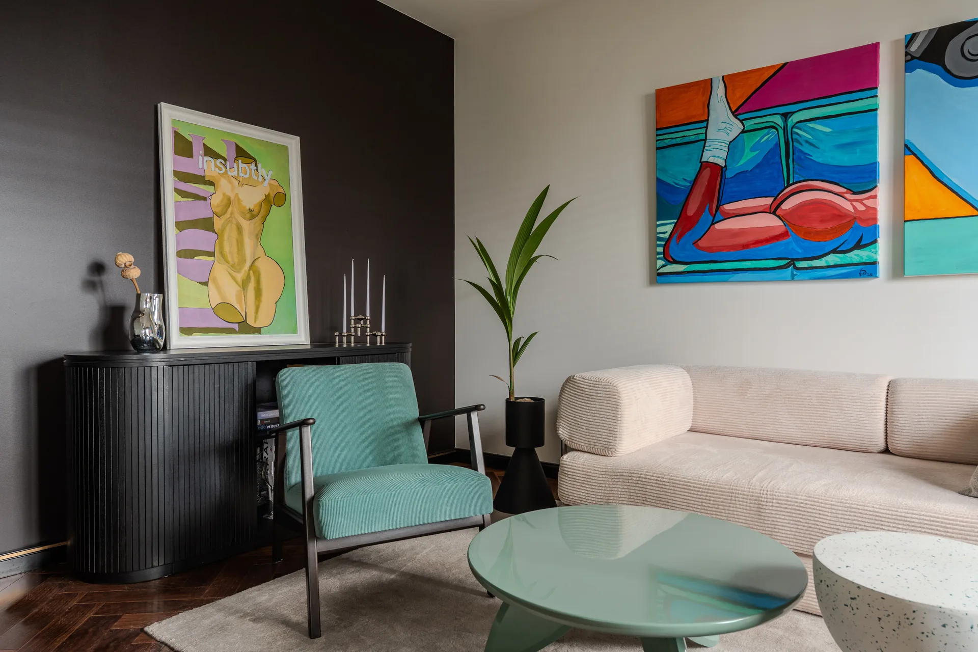 Lounge seating and colourful artwork in the Lunvio studio