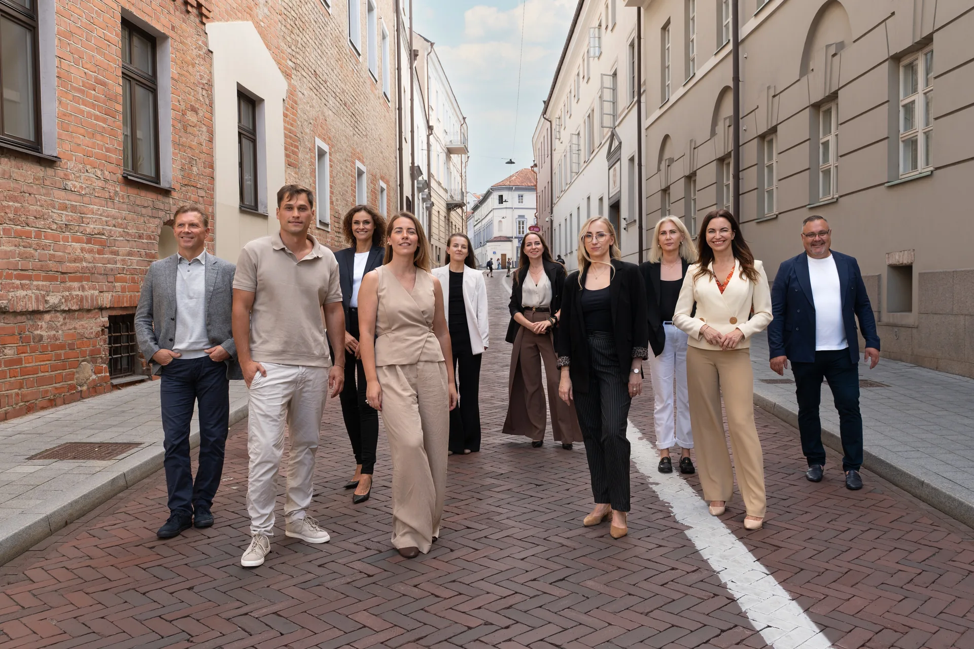 The Lunvio team walking together on a Vilnius street